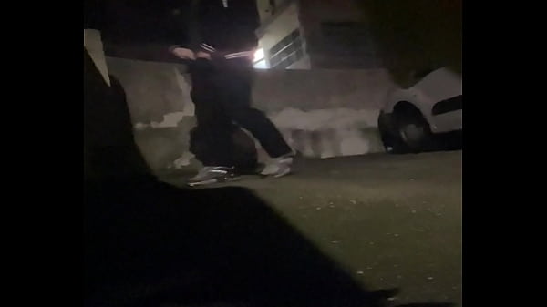 Amateur boy pissing in the street after party