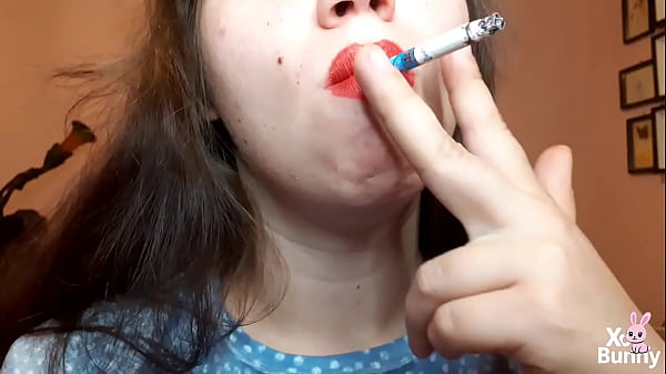 Nonton Natural Lips With Red Lipstick Smoking A Cigarette In Close Up thumbnail