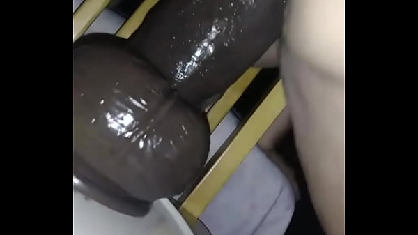 Bbw takes in a big black dildo 