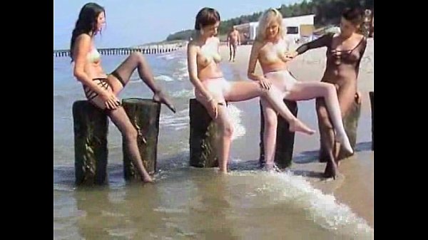 young_innocent_brunette plays_outside_at the beach