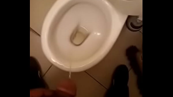 Ebony dick piss in toilet 