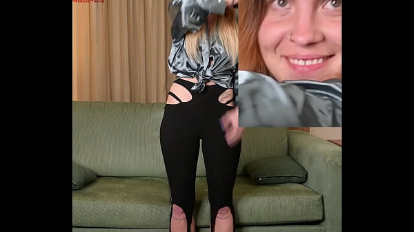 Hazel ash modeling a shiny shirt with leggings