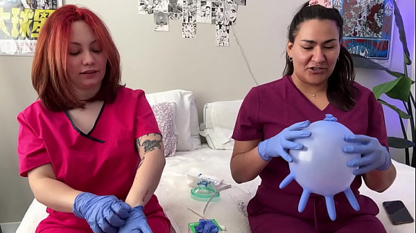 Hot nurses in scrubs mess around with gloves 