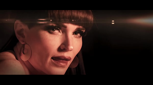 Natalie Mars Relaxing On A Bed thumbnail