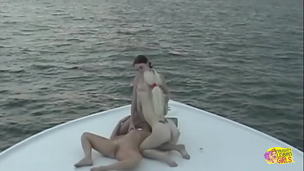 Three hornyamateurlesbians eat each others pussies and masturbatewhile on a boattrip