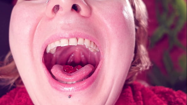 Eating jelly teddybears candies chewing mouth close up 