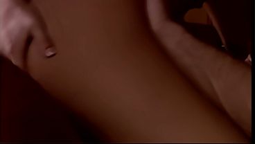 Her tits get massaged while she gives one guy a blowjob and gets her shaved twat screwed