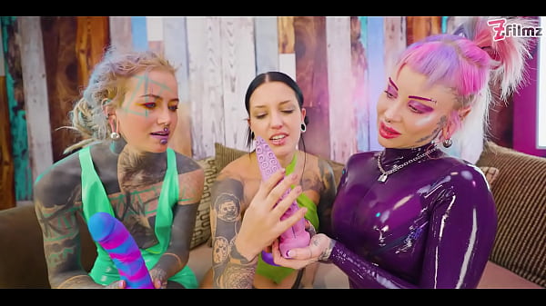 Two dominas gang up on goth chick to fill her holes with toys and make her cum 