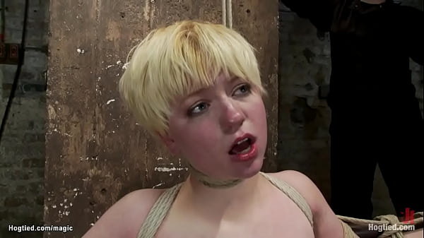 Gagged blonde lesbian slave alani pi hogtied with legs tied to wooden post gets spanked then on the ground ass fucked with dick on a stick by lezdom claire adams