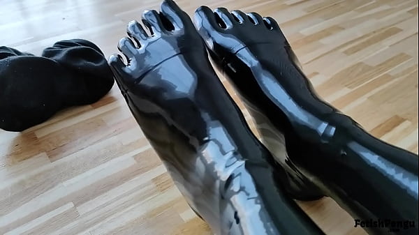 Putting_on latex toe socks and_shoes