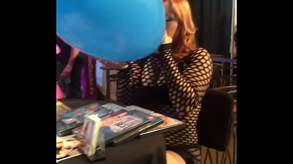 Edyn Blair blows up a giant balloon 