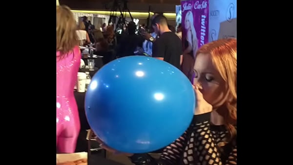 Edyn blair blows up a giant balloon