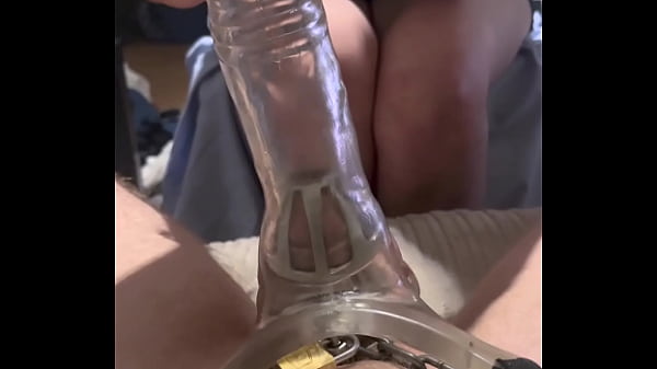 Made my chastity sub wear a cock sleeve and gave it a handjob