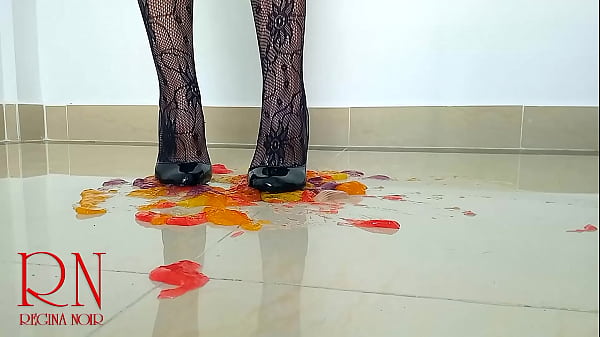 Sweet jeles destroying with high heels shoes on the floor. c1 