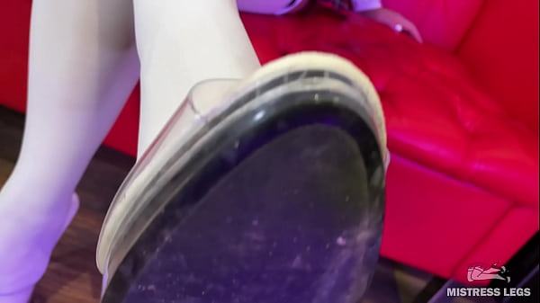 I sit on the couch in sexy white stockings and dangle my heels 