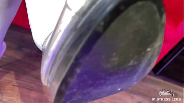 I sit on the couch in sexy white stockings and dangle my heels 