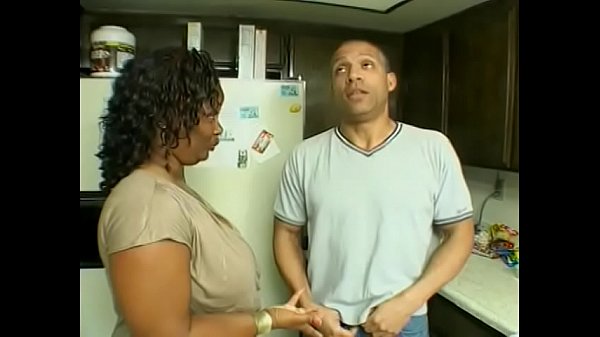 Hung stud gets his shaft and nuts sucked by ebony whore