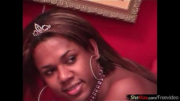 Black chick with dick shows off her fuckable ass and shecock 