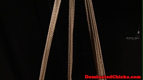 Busty restrained and whipped by dom