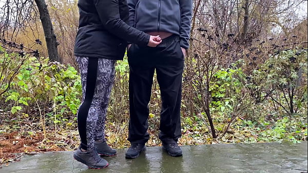 Stepmother in law controls son in law's cock outdoors