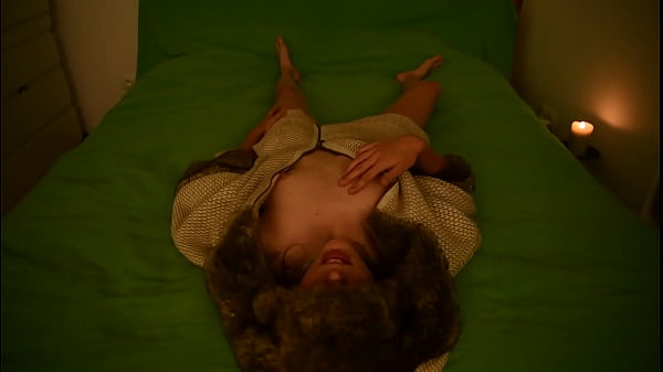 Young amateur teen masturbating_and moaning on the bed wearing fur coat