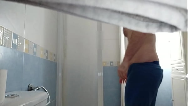 Voyeur hairy brother with erect dick while taking a shower 