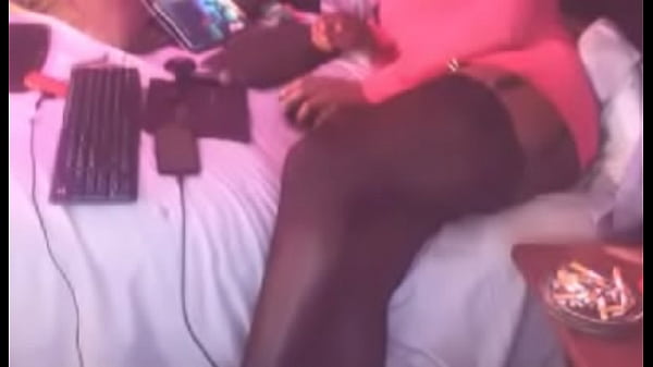 Crossdresser chilling out in closet 