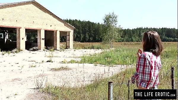 Sexy milf fucking herself hard in a collapsed building while tied with ropes 