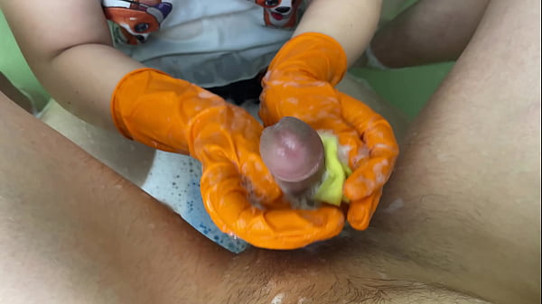 Cute student jerks off her teacher in thebathroom for a grade untilhe cums