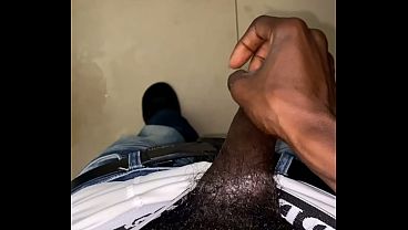 Thug beating his meat in the office