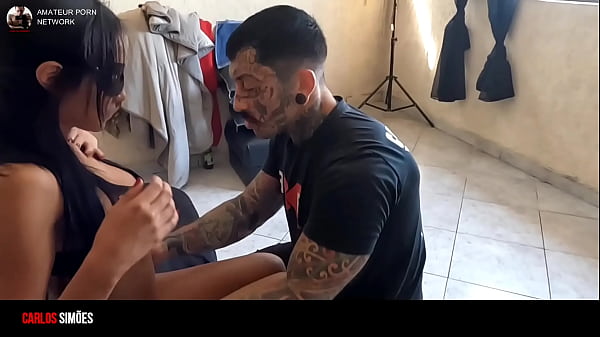 Beautiful young slim sexy girl with a tattooed muscular well endowed guy 