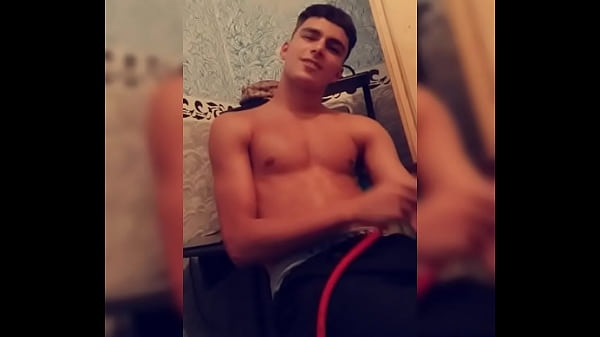 Handsome twink smoking shirtless