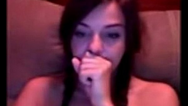 Pretty young girl rubs her pussy 