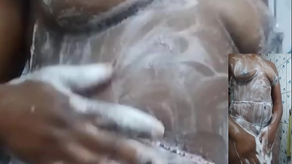 Ebony girl showering and soaping her body squirting