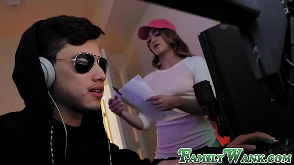 Cute Kenzie Madison needs help with her homework from her stepbro but he is too busy playing video games so she sucks his dick to get his attention 