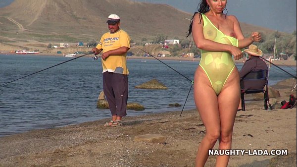 Play MP4 - Transparent swimsuit and nude on the beach