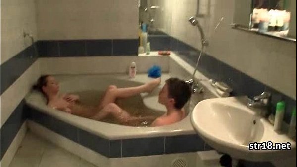 Amateur teen couple fucks in parents bed