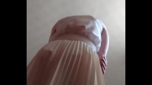 A discreet camera films up her skirt as she innocently does her job 