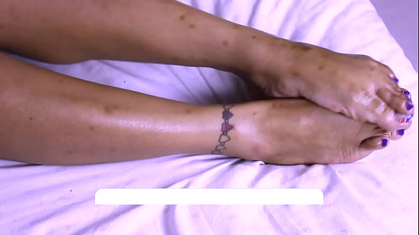 lightskin African girl uses her pretty feet to please a dick 