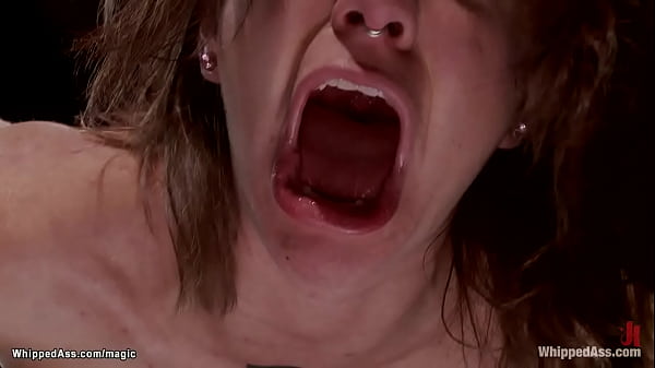 Bound lesbian slave bianca stone is mounted with all weight on pussy on wooden pony then anal fucked with dick on a stick by huge tits lezdom milf aiden starr