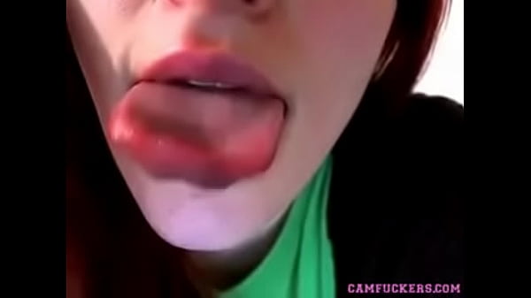 Play MP4 - Sexy redhead teen shows what she can do with her tongue