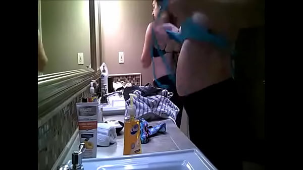 Big tits bathroom spycam