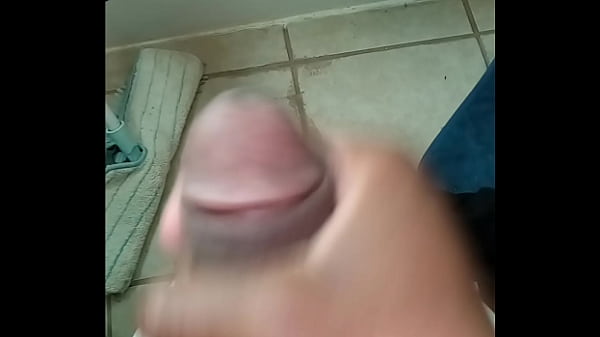 Love To stroke my small cock in the bathroom 9