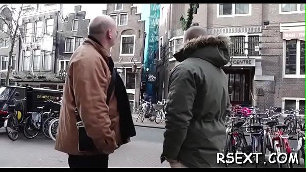 Black cutie sucks a large pole 