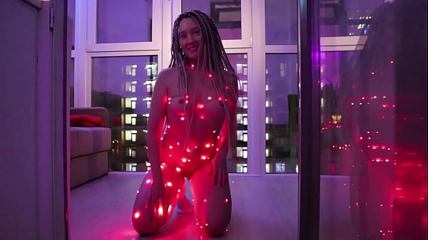 A Naked Girl Wrapped In Garlands Dances At Night In View Of The Neighbors 1 thumbnail