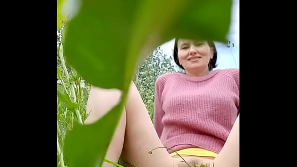Play MP4 - Naked horny MILF in a chamomile field masturbates&comma; pisses and wards off a wasp &sol; Angela-MILF
