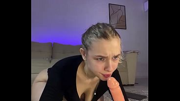 Squats and sucking big dildo 