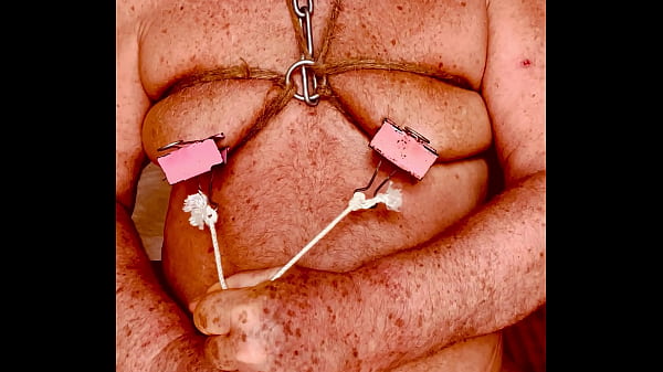 Seniormasochist pulls nipple clamps off
