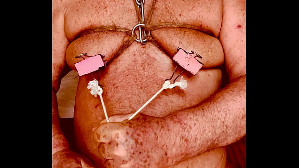 Seniormasochist pulls nipple clamps off