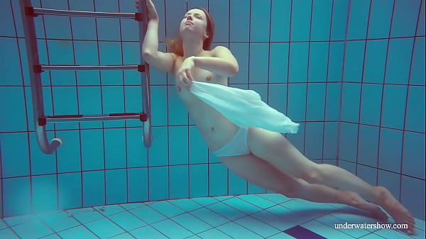 Hot babe Melisa Darkova dressed underwater